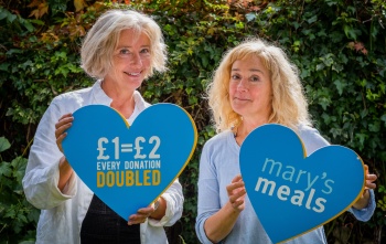 celebrity sisters Sophie and Emma Thomson posing for a campaign photo