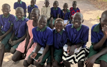 group of boys smiling for the camera