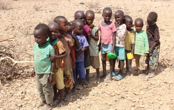Children lined up to receive their meal