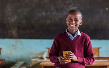 A young boy in a classroom