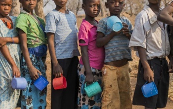 Students holding mugs