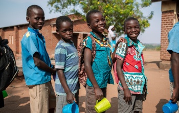 Children lined up to receive their meal