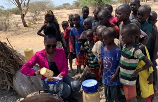 group of people lining up for food