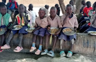 Children in South Sudan eating Mary's Meals