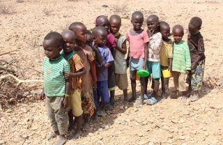 Children lined up to receive their meal