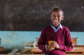 A young boy in a classroom