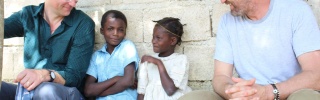Magnus and Gerard with children in Haiti