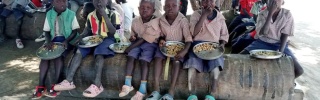 Children in South Sudan eating Mary's Meals