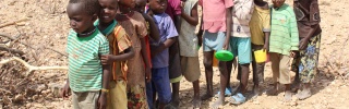 Children lined up to receive their meal