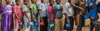 Students holding mugs