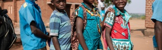 Children lined up to receive their meal