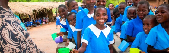 Children lined up to receive their meal