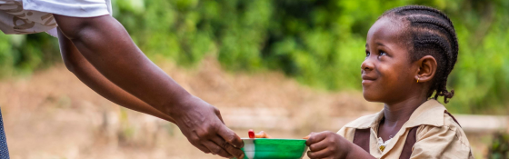 Child receiving meal