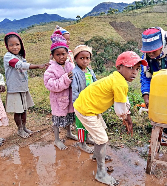 Children in Madagascar washing their hands. 