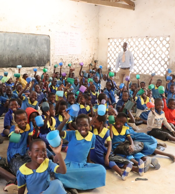Alexander Lulanga and his classroom of children in Malawi. 