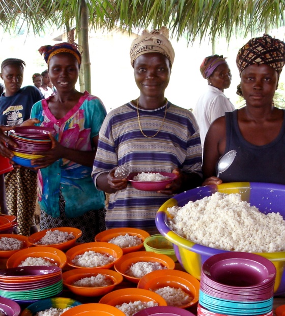 Volunteers serve food in Liberia