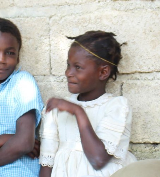 Magnus and Gerard with children in Haiti