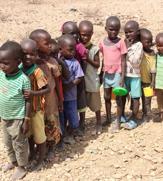 Children lined up to receive their meal