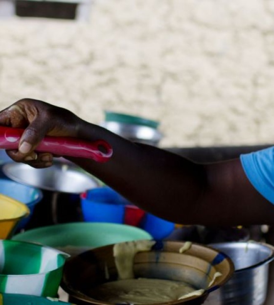 a volunteer serves food