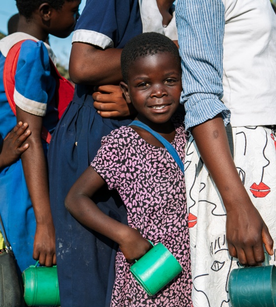 Children lined up to receive their meal