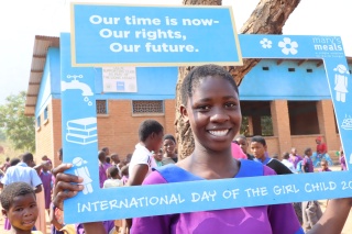 Children celebrate International Day of the Girl Child. 