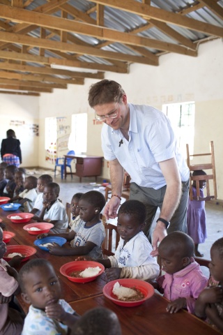 Magnus serving children in Malawi