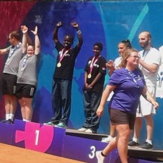 Patrick and Hannah at the Special Olympics podium