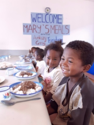 Children Eating and Smiling