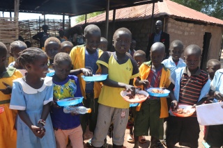 Students eating their Mary's Meals