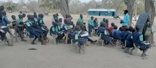 Students in outdoor classroom in South Sudan